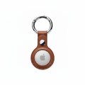 Brown leather keychain AirTag case centered on a pure white background