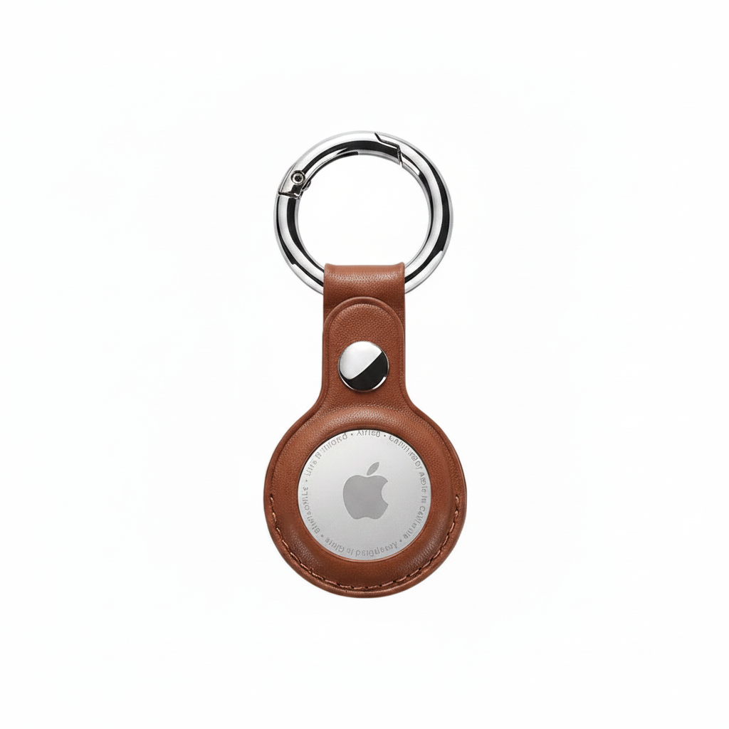 Brown leather keychain AirTag case centered on a pure white background